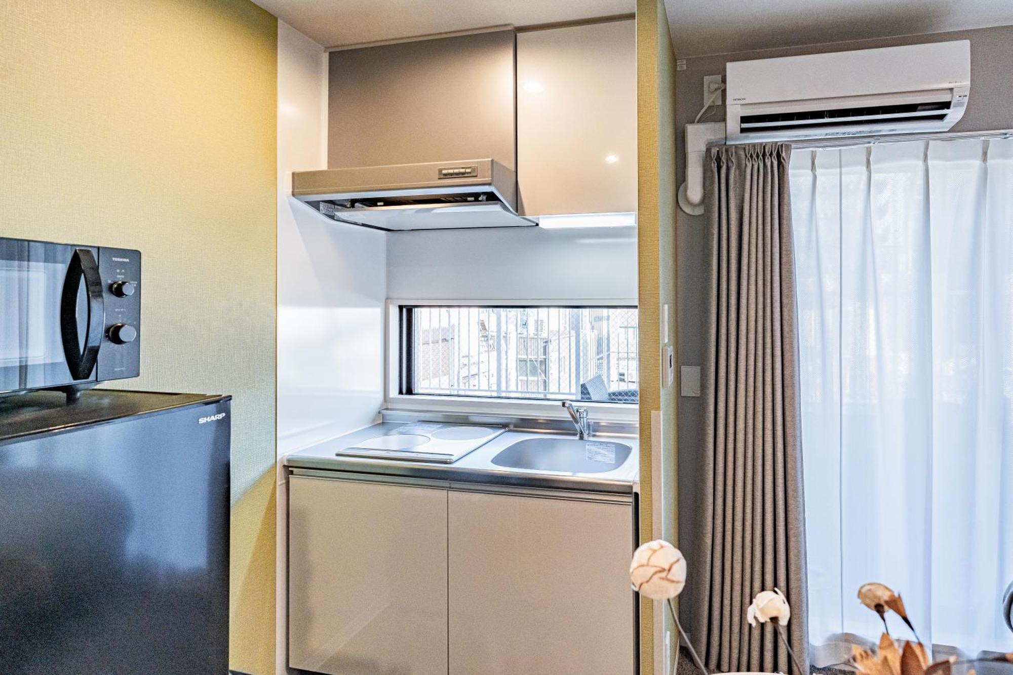 Apartment Hotel 11 Umeda Kamiyama Osaka Buitenkant foto