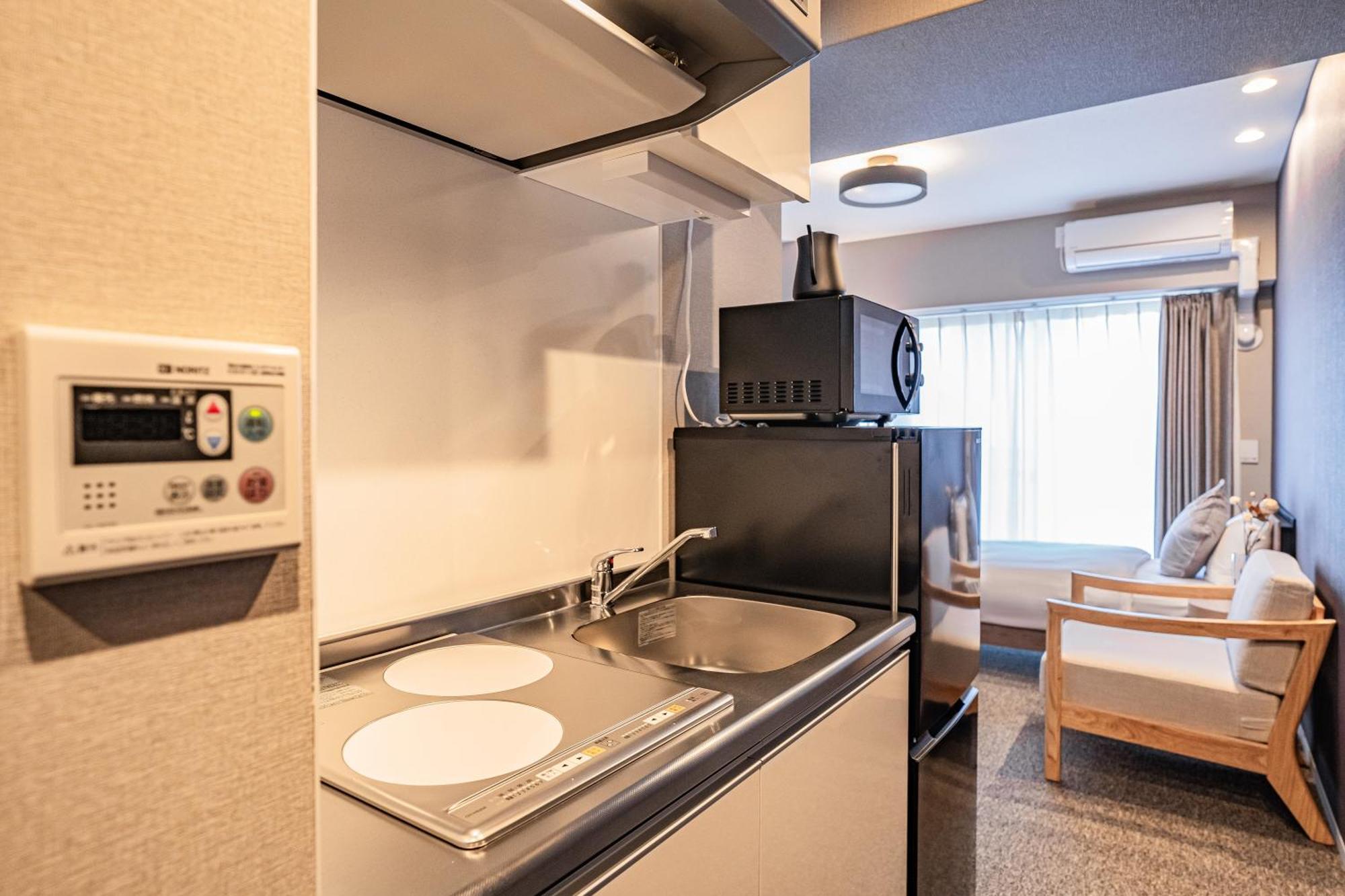 Apartment Hotel 11 Umeda Kamiyama Osaka Buitenkant foto